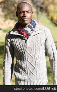 Portrait of black man wearing casual clothes in urban background