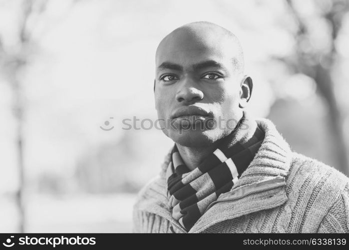 Portrait of black man wearing casual clothes in urban background