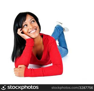 Portrait of black woman looking up smiling and laying on white background