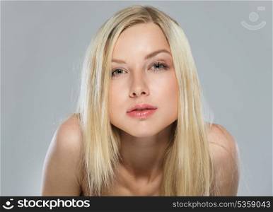 Portrait of blond hair cheeky teenage girl
