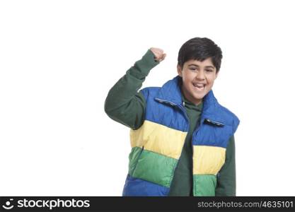 Portrait of boy cheering