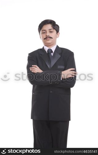 Portrait of boy dressed as businessman