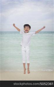 Portrait of boy jumping in the air