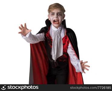 Portrait of boy wearing Halloween v&ire makeup and costume cloak bare his teeth, isolated on white background.. Boy in Halloween v&ire makeup costume
