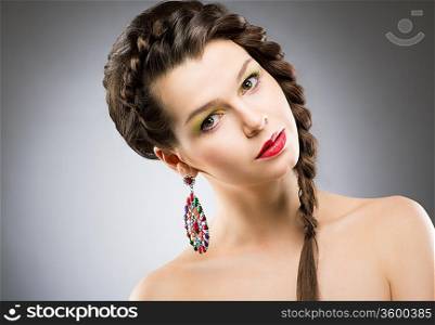Portrait of Bright Brunette with Jewellery - Round Colorful Earring. Shining Bijouterie