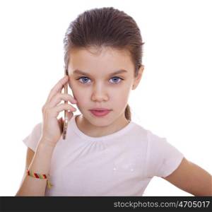 Portrait of brunette Caucasian schoolgirl calling by phone, isolated on white background