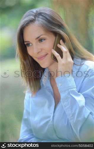 Portrait of brunette on telephone