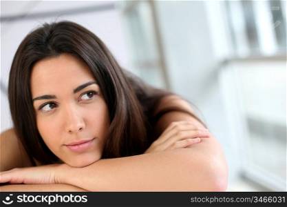Portrait of brunette with bored look
