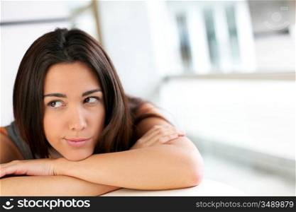 Portrait of brunette with bored look