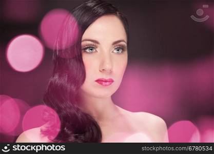 Portrait of brunette woman with 50s makeup