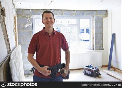 Portrait Of Builder Carrying Out Home Improvements