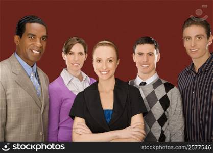 Portrait of business executives standing together and smiling