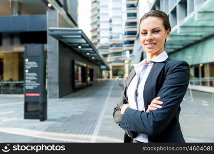 Portrait of business woman smiling outdoor. Portrait of young business woman outdoors