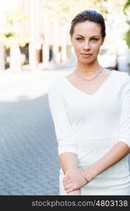 Portrait of business woman smiling outdoor. Portrait of young business woman outdoors