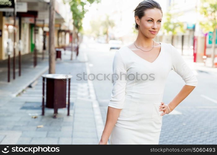 Portrait of business woman smiling outdoor. Portrait of young business woman outdoors