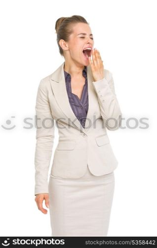 Portrait of business woman yawing