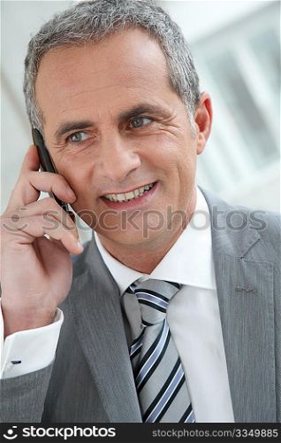 Portrait of businessman on the phone