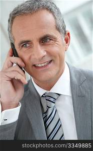 Portrait of businessman on the phone