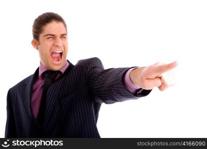 portrait of businessman pointing against white background