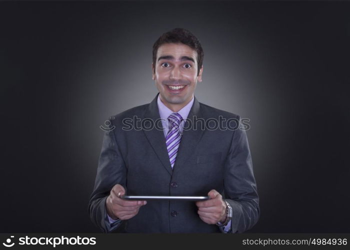 Portrait of businessman with digital tablet