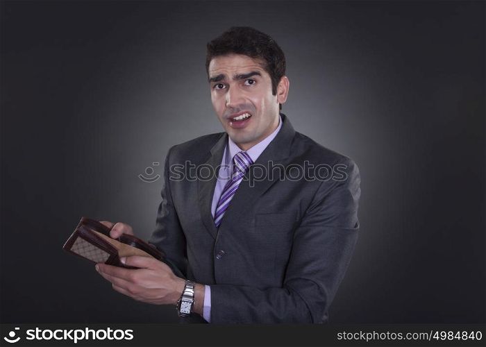 Portrait of businessman with empty wallet