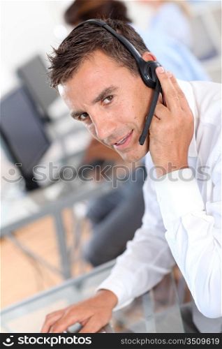 Portrait of businessman with headset