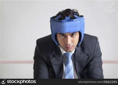 Portrait of businessman with protective headgear