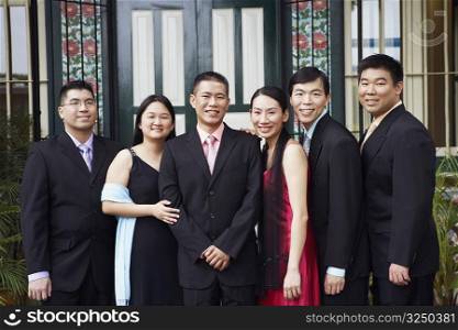 Portrait of businessmen and businesswomen smiling and standing