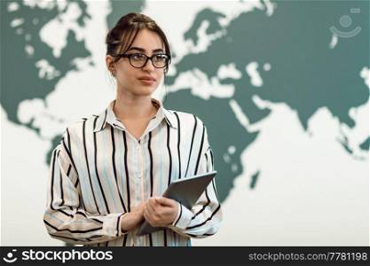 Portrait of businesswoman in casual clothes holding tablet computer at modern startup open plan office interior. Selective focus. High-quality photo. Portrait of businesswoman in casual clothes holding tablet computer at modern startup open plan office interior. Selective focus 