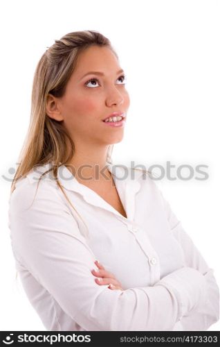 portrait of businesswoman looking up against white background