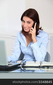 Portrait of businesswoman on the phone