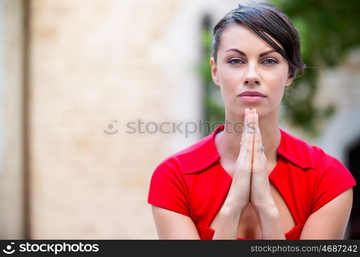 Portrait of businesswoman outside. Portrait of beautiful business woman in red dress