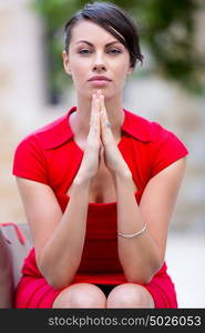 Portrait of businesswoman outside. Portrait of beautiful business woman in red dress