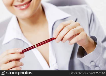 Portrait of businesswoman with laptop working at her office. Beautiful office manager