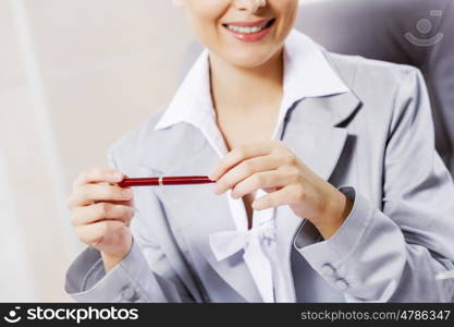 Portrait of businesswoman with laptop working at her office. Beautiful office manager