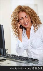 Portrait of businesswoman with mobilephone