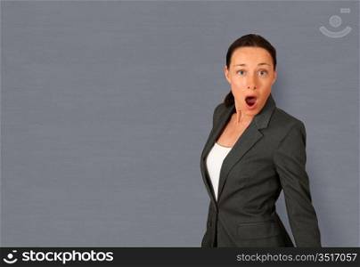 Portrait of businesswoman with surprised look
