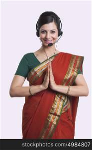 Portrait of call center operator greeting
