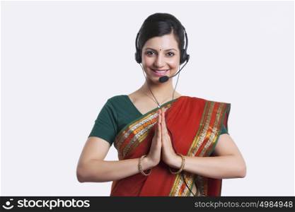 Portrait of call center operator greeting
