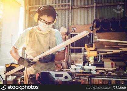Portrait of carpenter man with him job