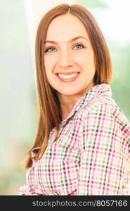 Portrait of caucasian brunette smiling woman