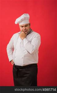 Portrait of caucasian man with chef uniform thinking