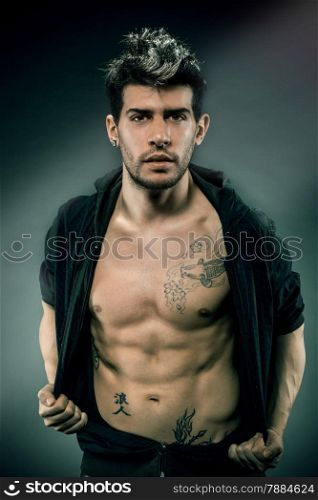 Portrait of caucasian man with great abdominal muscles