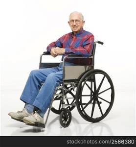 Portrait of Caucasion elderly man sitting in wheelchair smiling at viewer.