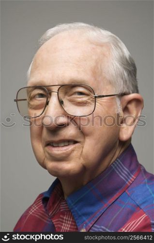 Portrait of Caucasion elderly man smiling.