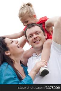 Portrait of cheerful couple with their daughter having fun over white background