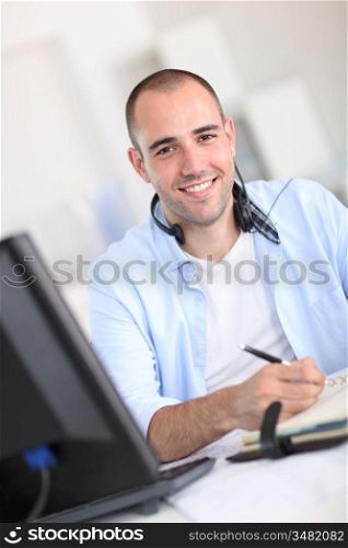 Portrait of cheerful customer service employee