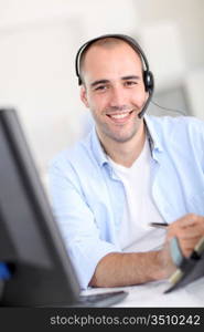 Portrait of cheerful customer service employee