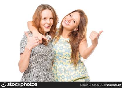 Portrait of cheerful friends embracing on a white background