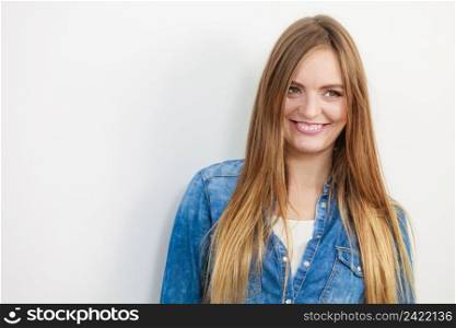 Portrait of cheerful girl. Young woman in jeans outfit. Fashion beauty leisure lifestyle concept. . Portrait of cheerful girl. 